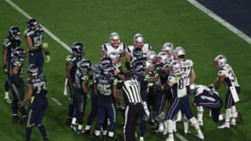 Feb 1, 2015; Glendale, AZ, USA; The New England Patriots and the Seattle Seahawks fight during the fourth quarter in Super Bowl XLIX at University of Phoenix Stadium. Mandatory Credit: Richard Mackson-USA TODAY Sports