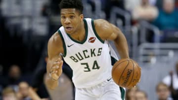 WASHINGTON, DC - JANUARY 6: Giannis Antetokounmpo #34 of the Milwaukee Bucks dribbles the ball against the Washington Wizards in the first half at Capital One Arena on January 6, 2018 in Washington, DC. (Photo by Rob Carr/Getty Images)