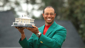 AUGUSTA, GEORGIA - APRIL 14: Tiger Woods of the United States celebrates with the Masters Trophy during the Green Jacket Ceremony after winning the Masters at Augusta National Golf Club on April 14, 2019 in Augusta, Georgia. (Photo by Andrew Redington/Getty Images)