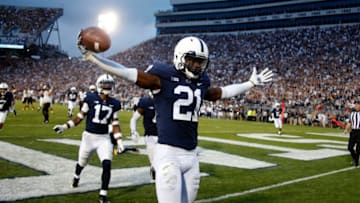 STATE COLLEGE, PA - SEPTEMBER 01: Amani Oruwariye #21 of the Penn State Nittany Lions celebrates after intercepting a pass in overtime to clinch the win against the Appalachian State Mountaineers on September 1, 2018 at Beaver Stadium in State College, Pennsylvania. (Photo by Justin K. Aller/Getty Images)
