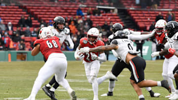 Cincinnati Bearcats linebacker Ivan Pace Jr reaches out to tackle Louisville Cardinals running back Maurice Turner during Fenway Bowl. USA Today.