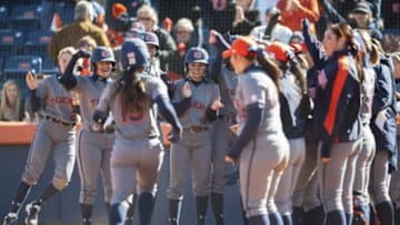 Bree Fornis (15) is greeted by teammates after a grand slam.Butler vs Auburn in Auburn, Ala. on Saturday, Feb. 13, 2016.Dakota Sumpter/Auburn Athletics