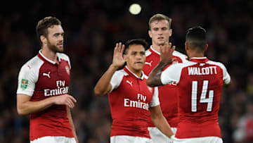 LONDON, ENGLAND - SEPTEMBER 20: Theo Walcott of Arsenal celebrates scoring his sides first goal with his Arsenal team mates during the Carabao Cup Third Round match between Arsenal and Doncaster Rovers at Emirates Stadium on September 20, 2017 in London, England. (Photo by Mike Hewitt/Getty Images)