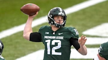 Michigan State's Rocky Lombardi throws a pass against Ohio State during the second quarter on Saturday, Dec. 5, 2020, at Spartan Stadium in East Lansing.201205 Msu Osu 136a