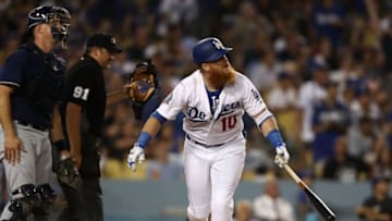 LOS ANGELES, CA - AUGUST 02: Justin Turner #10 of the Los Angeles Dodgers watches his hit go for a homerun in the sixth inning during the MLB game against the Milwaukee Brewers at Dodger Stadium on August 2, 2018 in Los Angeles, California. (Photo by Victor Decolongon/Getty Images)