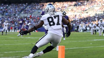 BALTIMORE, MARYLAND - NOVEMBER 25: Tight End Jared Cook #87 of the Oakland Raiders catches a touchdown in the third quarter against the Baltimore Ravens at M&T Bank Stadium on November 25, 2018 in Baltimore, Maryland. (Photo by Patrick Smith/Getty Images)