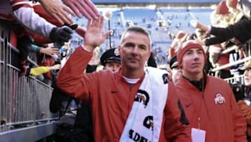 Nov 28, 2015; Ann Arbor, MI, USA; Ohio State Buckeyes head coach Urban Meyer walks off the field after the game against the Michigan Wolverines at Michigan Stadium. Ohio State won 42-13. Mandatory Credit: Tim Fuller-USA TODAY Sports