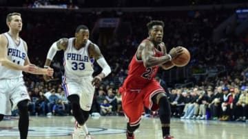Jan 14, 2016; Philadelphia, PA, USA; Chicago Bulls guard Jimmy Butler (21) drives toward the net during the fourth quarter of the game against the Philadelphia 76ers at the Wells Fargo Center. The Chicago Bulls won the game 115-111 in overtime. Mandatory Credit: John Geliebter-USA TODAY Sports
