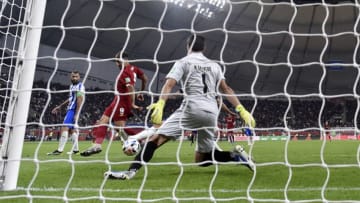 DOHA, QATAR - DECEMBER 18: Roberto Firmino of Liverpool scores his team's second goal past Marcelo Barovero of C.F. Monterrey during the FIFA Club World Cup semi-final match between Monterrey and Liverpool FC at Khalifa International Stadium on December 18, 2019 in Doha, Qatar. (Photo by David Ramos - FIFA/FIFA via Getty Images)