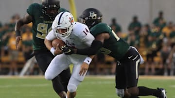 WACO, TX - SEPTEMBER 09: Dalton Sturm #14 of the UTSA Roadrunners is tackled by Jourdan Blake #23 of the Baylor Bears at McLane Stadium on September 9, 2017 in Waco, Texas. (Photo by Ronald Martinez/Getty Images)