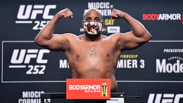 LAS VEGAS, NEVADA - AUGUST 14: In this handout image provided by UFC, Daniel Cormier poses on the scale during the UFC 252 weigh-in at UFC APEX on August 14, 2020 in Las Vegas, Nevada. (Photo by Jeff Bottari/Zuffa LLC via Getty Images)