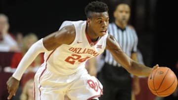 Dec 12, 2015; Norman, OK, USA; Oklahoma Sooners guard Buddy Hield (24) brings the ball up the court against the Oral Roberts Golden Eagles during the first half at Lloyd Noble Center. Mandatory Credit: Mark D. Smith-USA TODAY Sports