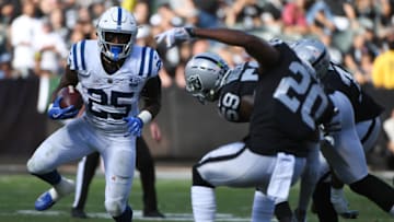 OAKLAND, CA - OCTOBER 28: Marlon Mack #25 of the Indianapolis Colts rushes with the ball against the Oakland Raiders during their NFL game at Oakland-Alameda County Coliseum on October 28, 2018 in Oakland, California. (Photo by Robert Reiners/Getty Images)