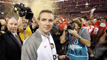 Jan 12, 2015; Arlington, TX, USA; Ohio State Buckeyes head coach Urban Meyer on the field after the 2015 CFP National Championship Game against the Oregon Ducks at AT&T Stadium. Mandatory Credit: Matthew Emmons-USA TODAY Sports