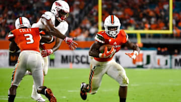 Sep 10, 2016; Miami Gardens, FL, USA; Miami Hurricanes running back Mark Walton (1) carries the ball during the second half against Florida Atlantic Owls at Hard Rock Stadium. Miami won 38-10. Mandatory Credit: Steve Mitchell-USA TODAY Sports