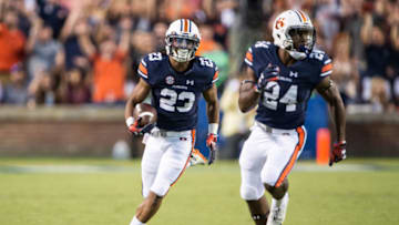 Ryan Davis didn't find much running room on punt returns. (Photo by Michael Chang/Getty Images)