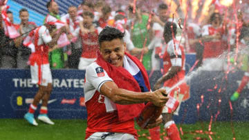 LONDON, ENGLAND - MAY 27: Alexis Sanchez of Arsenal celebrates victory after the Emirates FA Cup Final between Arsenal and Chelsea at Wembley Stadium on May 27, 2017 in London, England. (Photo by Laurence Griffiths/Getty Images)