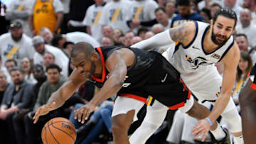 SALT LAKE CITY, UT - APRIL 22: Chris Paul #3 of the Houston Rockets is fouled by Ricky Rubio #3 of the Utah Jazz in the second half of Game Four during the first round of the 2019 NBA Western Conference Playoffs at Vivint Smart Home Arena on April 22, 2019 in Salt Lake City, Utah. NOTE TO USER: User expressly acknowledges and agrees that, by downloading and or using this photograph, User is consenting to the terms and conditions of the Getty Images License Agreement. (Photo by Gene Sweeney Jr./Getty Images)