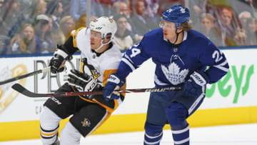 TORONTO, ON - OCTOBER 18: Sidney Crosby #87 of the Pittsburgh Penguins skates against Kasperi Kapanen #24 of the Toronto Maple Leafs during an NHL game at Scotiabank Arena on October 18, 2018 in Toronto, Ontario, Canada. The Penguins defeated the Maple Leafs 3-0.(Photo by Claus Andersen/Getty Images)