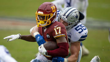 LANDOVER, MD - OCTOBER 25: Terry McLaurin #17 of the Washington Football Team is tackled by Leighton Vander Esch #55 of the Dallas Cowboys after a reception during the second half at FedExField on October 25, 2020 in Landover, Maryland. (Photo by Scott Taetsch/Getty Images)