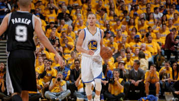 OAKLAND, CA - MAY 16: Stephen Curry #30 of the Golden State Warriors brings the ball up the court against the San Antonio Spurs in Game Six of the Western Conference Semifinals during the 2013 NBA Playoffs on May 16, 2013 at Oracle Arena in Oakland, California. NOTE TO USER: User expressly acknowledges and agrees that, by downloading and or using this photograph, user is consenting to the terms and conditions of Getty Images License Agreement. Mandatory Copyright Notice: Copyright 2013 NBAE (Photo by Rocky Widner/NBAE via Getty Images)