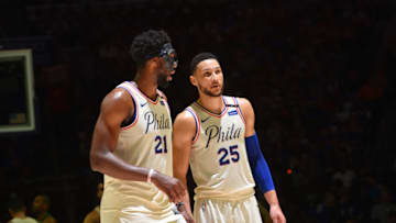 PHILADELPHIA, PA - May 5: Joel Embiid #21 and Ben Simmons #25 of the Philadelphia 76ers look on against the Boston Celtics during Game Three of the Eastern Conference Semi Finals of the 2018 NBA Playoffs on May 5, 2018 in Philadelphia, Pennsylvania NOTE TO USER: User expressly acknowledges and agrees that, by downloading and/or using this Photograph, user is consenting to the terms and conditions of the Getty Images License Agreement. Mandatory Copyright Notice: Copyright 2018 NBAE (Photo by Jesse D. Garrabrant/NBAE via Getty Images)