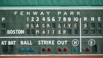 BOSTON, MA - JUNE 2: A Black Lives Matter message is displayed on the Green Monster scoreboard in response to the recent death of George Floyd on June 2, 2020 at Fenway Park in Boston, Massachusetts. Protests spread across cities in the U.S., and in other parts of the world in response to the death of African American George Floyd while in police custody in Minneapolis, Minnesota. (Photo by Billie Weiss/Boston Red Sox/Getty Images)