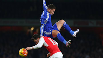 LONDON, ENGLAND - JANUARY 24: Eden Hazard of Chelsea on the shoulders of Mesut Ozil of Arsenal during the Barclays Premier League match between Arsenal and Chelsea at the Emirates Stadium on January 24, 2016 in London, England. (Photo by Catherine Ivill - AMA/Getty Images)