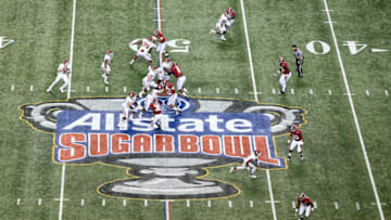 NEW ORLEANS, LA - JANUARY 02: Trevor Knight #9 of the Oklahoma Sooners passes against the Alabama Crimson Tide during the Allstate Sugar Bowl at the Mercedes-Benz Superdome on January 2, 2014 in New Orleans, Louisiana. (Photo by Sean Gardner/Getty Images)