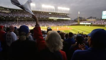 Oct 12, 2015; Chicago, IL, USA; A fan waves a rally towel during game three of the NLDS between the Chicago Cubs and the St. Louis Cardinals at Wrigley Field. Mandatory Credit: Caylor Arnold-USA TODAY Sports