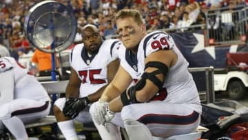 Sep 22, 2016; Foxborough, MA, USA; Houston Texans defensive end J.J. Watt (99) and nose tackle Vince Wilfork (75) sit on the bench during the second half against the New England Patriots at Gillette Stadium. Mandatory Credit: Winslow Townson-USA TODAY Sports