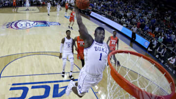 CHARLOTTE, NORTH CAROLINA - MARCH 14: Zion Williamson #1 of the Duke Blue Devils dunks the ball against the Syracuse Orange during their game in the quarterfinal round of the 2019 Men's ACC Basketball Tournament at Spectrum Center on March 14, 2019 in Charlotte, North Carolina. (Photo by Streeter Lecka/Getty Images)