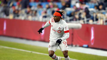 TORONTO, ON - MARCH 07: Ifunanyachi Achara #99 of Toronto FC dribbles the ball during the second half of an MLS game against New York City FC at BMO Field on March 07, 2020 in Toronto, Canada. (Photo by Vaughn Ridley/Getty Images)