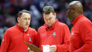 SAN DIEGO, CALIFORNIA - MARCH 20: Head coach Tommy Lloyd of the Arizona Wildcats stands with assistant coaches during a time out against the TCU Horned Frogs during the first half in the second round game of the 2022 NCAA Men's Basketball Tournament at Viejas Arena at San Diego State University on March 20, 2022 in San Diego, California. (Photo by Sean M. Haffey/Getty Images)