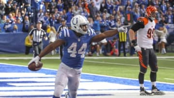 Oct 19, 2014; Indianapolis, IN, USA; Indianapolis Colts running back Ahmad Bradshaw (44) reacts to scoring a touchdown against the Cincinnati Bengals at Lucas Oil Stadium. Indianapolis defeats Cincinnati 27-0. Mandatory Credit: Brian Spurlock-USA TODAY Sports