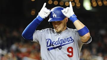 Jul 19, 2016; Washington, DC, USA; Los Angeles Dodgers catcher Yasmani Grandal (9) celebrates after hitting a solo home run against the Washington Nationals during the ninth inning at Nationals Park. Mandatory Credit: Brad Mills-USA TODAY Sports