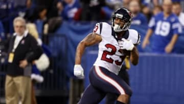 Dec 14, 2014; Indianapolis, IN, USA; Houston Texans running back Arian Foster (23) runs with the ball against the Indianapolis Colts at Lucas Oil Stadium. Indianapolis defeats Houston 17-10. Mandatory Credit: Brian Spurlock-USA TODAY Sports