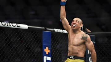 Dec 14, 2019; Las Vegas, NV, USA; (Editors Notes: Caption Correction) Jose Aldo (blue gloves) reacts after his bout against Marlon Moraes (not pictured) during UFC 245 at T-Mobile Arena. Mandatory Credit: Stephen R. Sylvanie-USA TODAY Sports