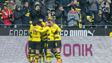 DORTMUND, GERMANY - MARCH 18: Michy Batshuayi of Borussia Dortmund celebrates scoring the opening goal with his team mates during the Bundesliga match between Borussia Dortmund and Hannover 96 at the Signal Iduna Park on March 18, 2018 in Dortmund, Germany. (Photo by Alexandre Simoes/Borussia Dortmund/Getty Images)