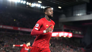 LIVERPOOL, ENGLAND - DECEMBER 04: Divock Origi of Liverpool celebrates after scoring his team's first goal during the Premier League match between Liverpool FC and Everton FC at Anfield on December 04, 2019 in Liverpool, United Kingdom. (Photo by Laurence Griffiths/Getty Images)