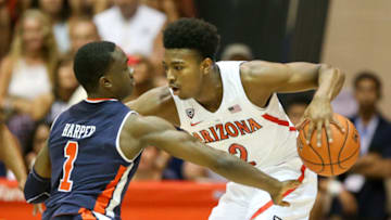 LAHAINA, HI - NOVEMBER 21: Brandon Williams #2 of the Arizona Wildcats manages to keep the ball away from Jared Harper #1 of the Auburn Tigers as he tries to knock the ball loose during the first half of the game at the Lahaina Civic Center on November 21, 2018 in Lahaina, Hawaii. (Photo by Darryl Oumi/Getty Images)