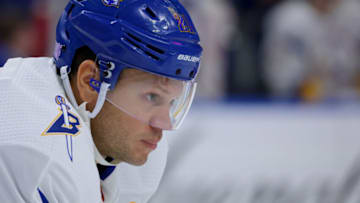 Nov 25, 2022; Buffalo, New York, USA; Buffalo Sabres right wing Kyle Okposo (21) waits for a face-off during the third period against the New Jersey Devils at KeyBank Center. Mandatory Credit: Timothy T. Ludwig-USA TODAY Sports