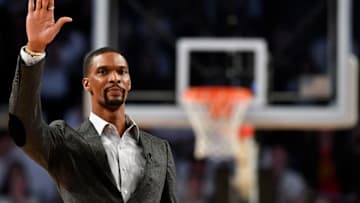 ATLANTA, GA - JANUARY 28: Former Georgia Tech Yellow Jackets player Chris Bosh waves to the crowd during a stoppage in play of the Yellow Jackets' basketball game against the Clemson Tigers at Hank McCamish Pavilion on January 28, 2018 in Atlanta, Georgia. (Photo by Mike Comer/Getty Images)