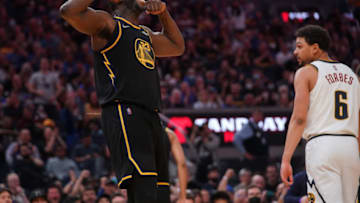 Apr 16, 2022; San Francisco, California, USA; Golden State Warriors forward Draymond Green (23) reacts after making a basket while being fouled against the Denver Nuggets in the fourth quarter during game one of the first round for the 2022 NBA playoffs at the Chase Center. Mandatory Credit: Cary Edmondson-USA TODAY Sports