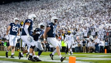 UNIVERSITY PARK, PA - OCTOBER 19: Sean Clifford #14 of the Penn State Nittany Lions celebrates a touchdown run during the second quarter against the Michigan Wolverines on October 19, 2019 at Beaver Stadium in University Park, Pennsylvania. (Photo by Brett Carlsen/Getty Images)