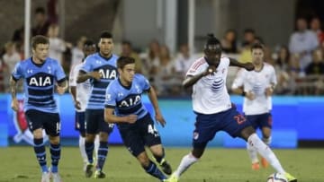 Jul 29, 2015; Denver, CO, USA; MLS All Stars forward Kei Kamara (23) of Columbus Crew FC plays the ball ahead of Tottenham Hotspur midfielder Harry Winks (44) during the second half of the 2015 MLS All Star Game at Dick
