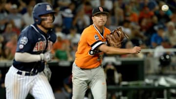 Jun 20, 2016; Omaha, NE, USA; Oklahoma State Cowboys pitcher Tyler Buffett (37) throws out Arizona Wildcats outfielder Zach Gibbons (23) in the sixth inning in the 2016 College World Series at TD Ameritrade Park. Oklahoma State defeated Arizona 1-0. Mandatory Credit: Steven Branscombe-USA TODAY Sports