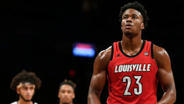 NEW YORK, NEW YORK - NOVEMBER 23: Steven Enoch #23 of the Louisville Cardinals takes a free throw during the second half of the game against Marquette Golden Eagles at the NIT Season Tip-Off Tournament at Barclays Center on November 23, 2018 in the Brooklyn borough of New York City. (Photo by Sarah Stier/Getty Images)