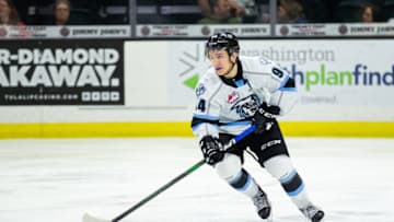 EVERETT, WASHINGTON - NOVEMBER 16: Winnipeg Ice forward Connor McClennon #94 skates with the puck in the third period during a game against the Everett Silvertips at Angel of the Winds Arena on November 16, 2019 in Everett, Washington. (Photo by Christopher Mast/Getty Images)