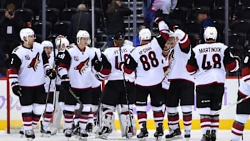Nov 8, 2016; Denver, CO, USA; Members of the Arizona Coyotes celebrate the win over the Colorado Avalanche at Pepsi Center. The Coyotes defeated the Avalanche 4-2. Mandatory Credit: Ron Chenoy-USA TODAY Sports